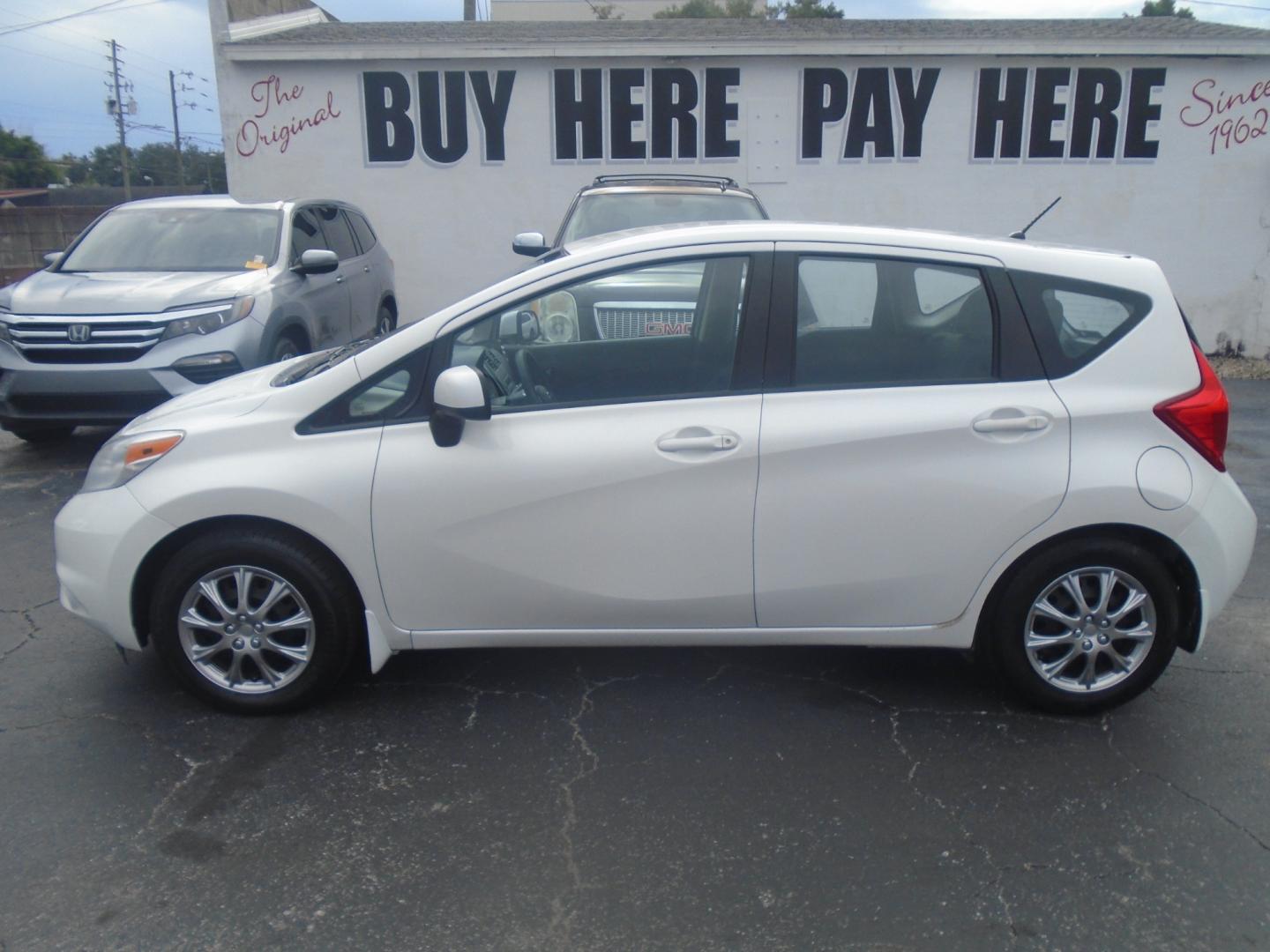 2014 Nissan Versa Note S (3N1CE2CP1EL) with an 1.6L L4 DOHC 16V engine, 5-Speed Manual transmission, located at 6112 N Florida Avenue, Tampa, FL, 33604, (888) 521-5131, 27.954929, -82.459534 - Photo#0